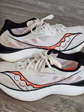 Saucony Women’s White and Coral Athletic Running Shoes